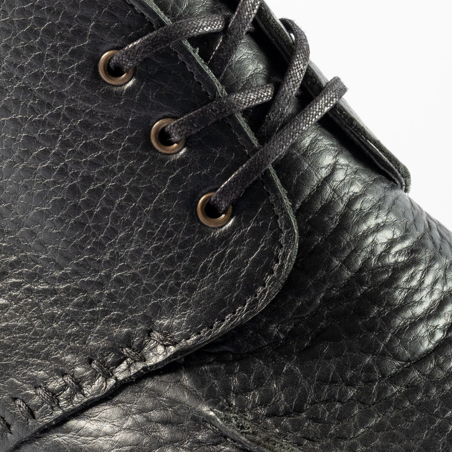 Closeup of ladder stitching on quarters of Edgware Ankle Boot in Black Horween Veg Tanned Bison