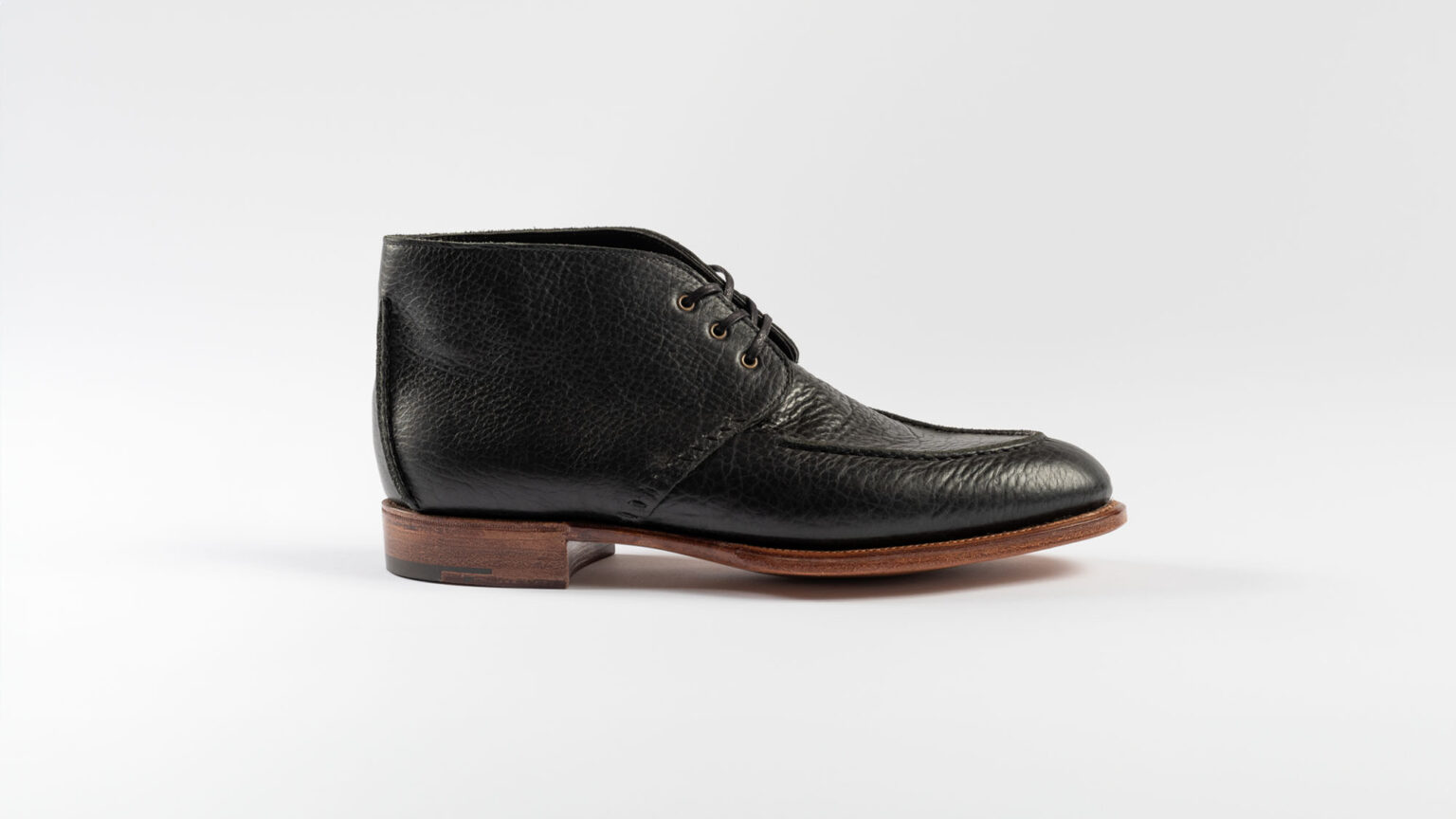 Side view of Edgware Ankle Boot in Black Horween Veg Tanned Bison