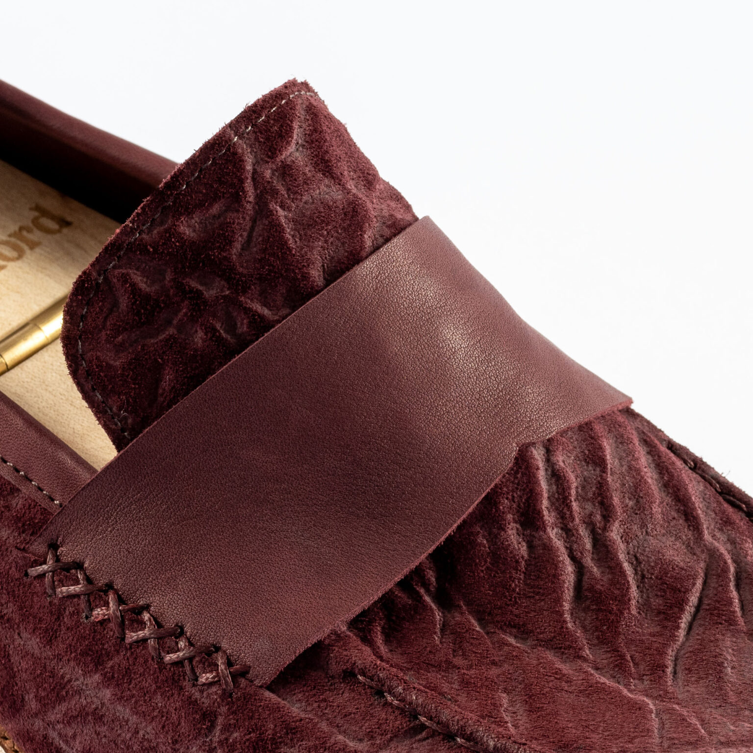 Closeup of stitched strap on Fen Baseball Loafer in Nordic Red CF Stead Janus Calf with Edwin emboss