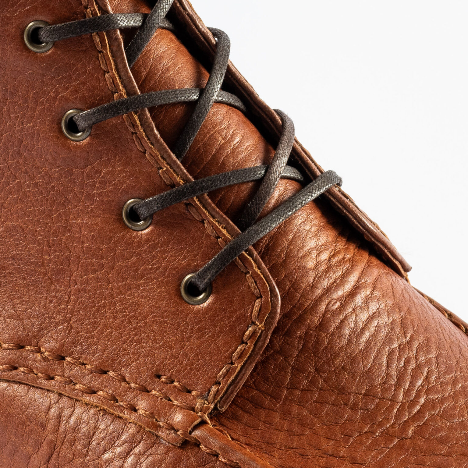 Closeup of tongue and quarters on Foxley Padded Ankle Boot in Tan Horween Veg Tanned Bison