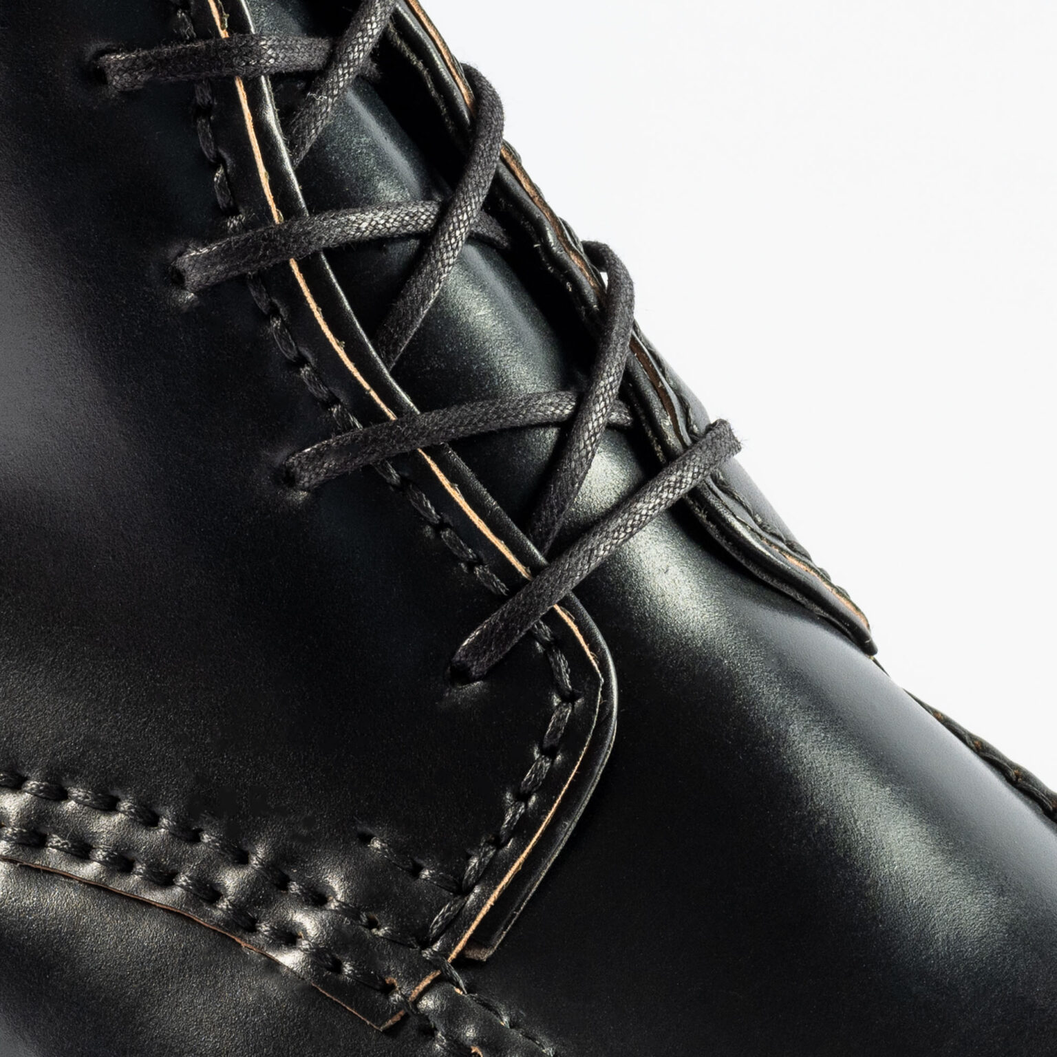 Closeup of tongue and quarters on Foxley Padded Ankle Boot in Black Horween Shell Cordovan