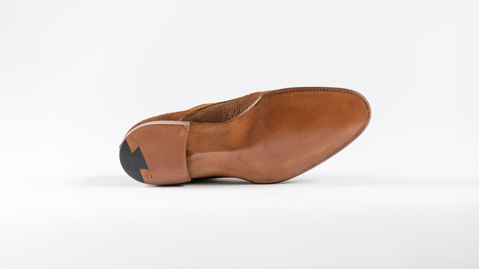 Sole of Kennington Gibson in Dark Chestnut CF Stead Janus Calf with Ernest emboss