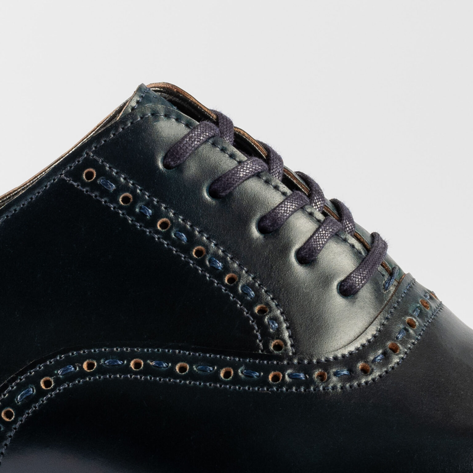 Side view closeup of Redbourne Oxford in Navy Horween Shell Cordovan