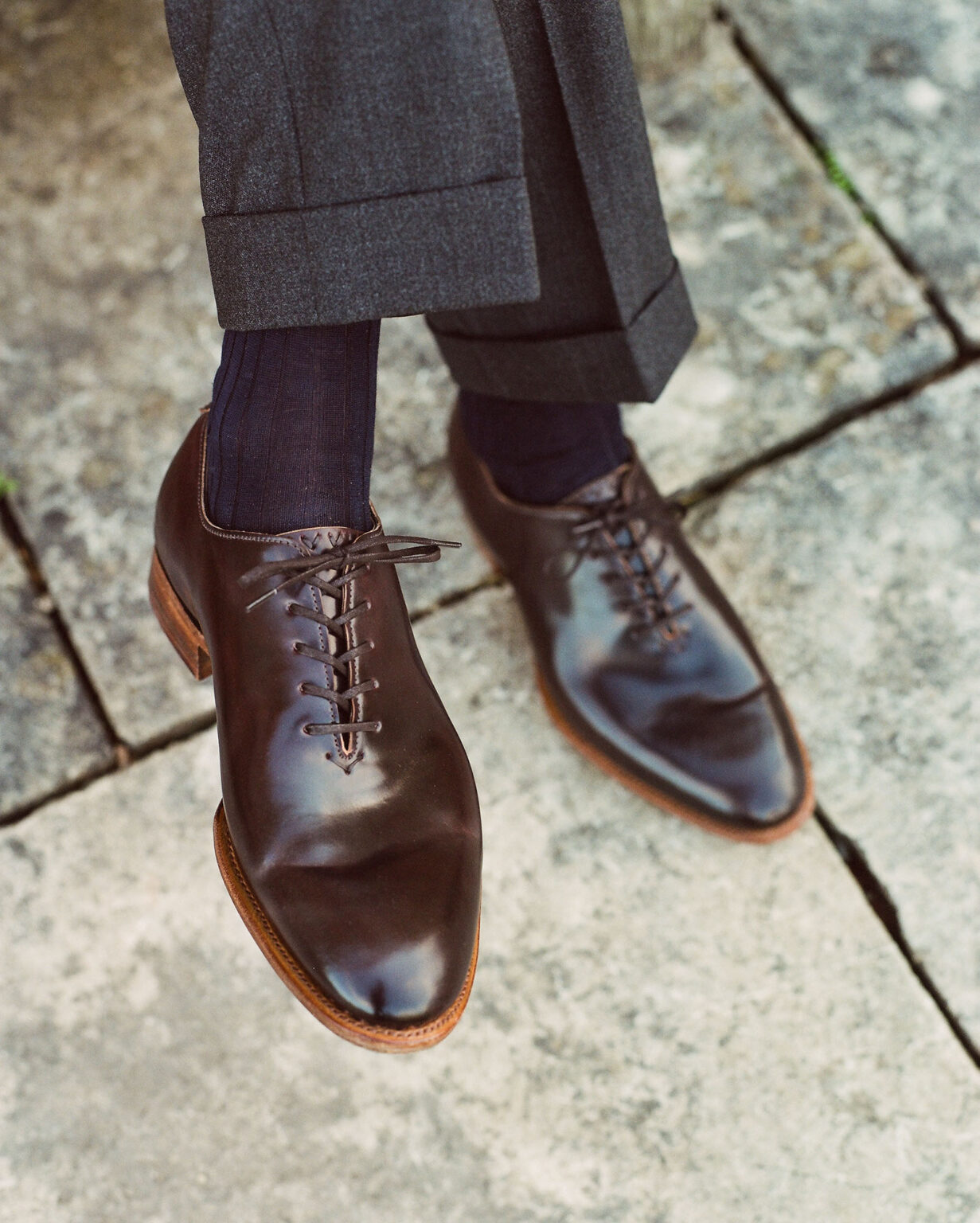 Closeup of a pair of E.Woodford Regent Wholecuts in Dark Cognac Horween Shell Cordovan