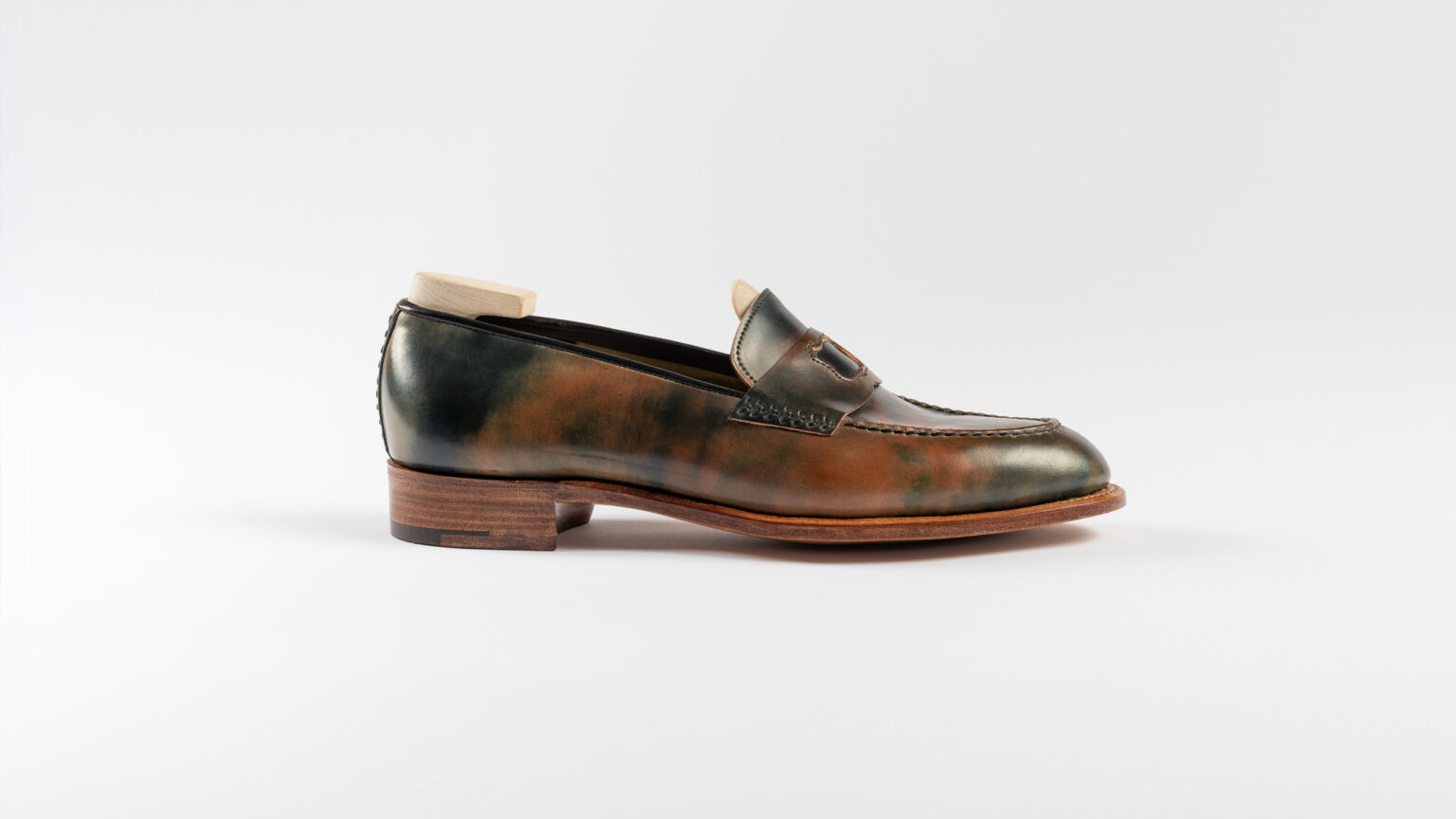 Side view of Watling Penny Loafer in Black Marbled Horween Shell Cordovan