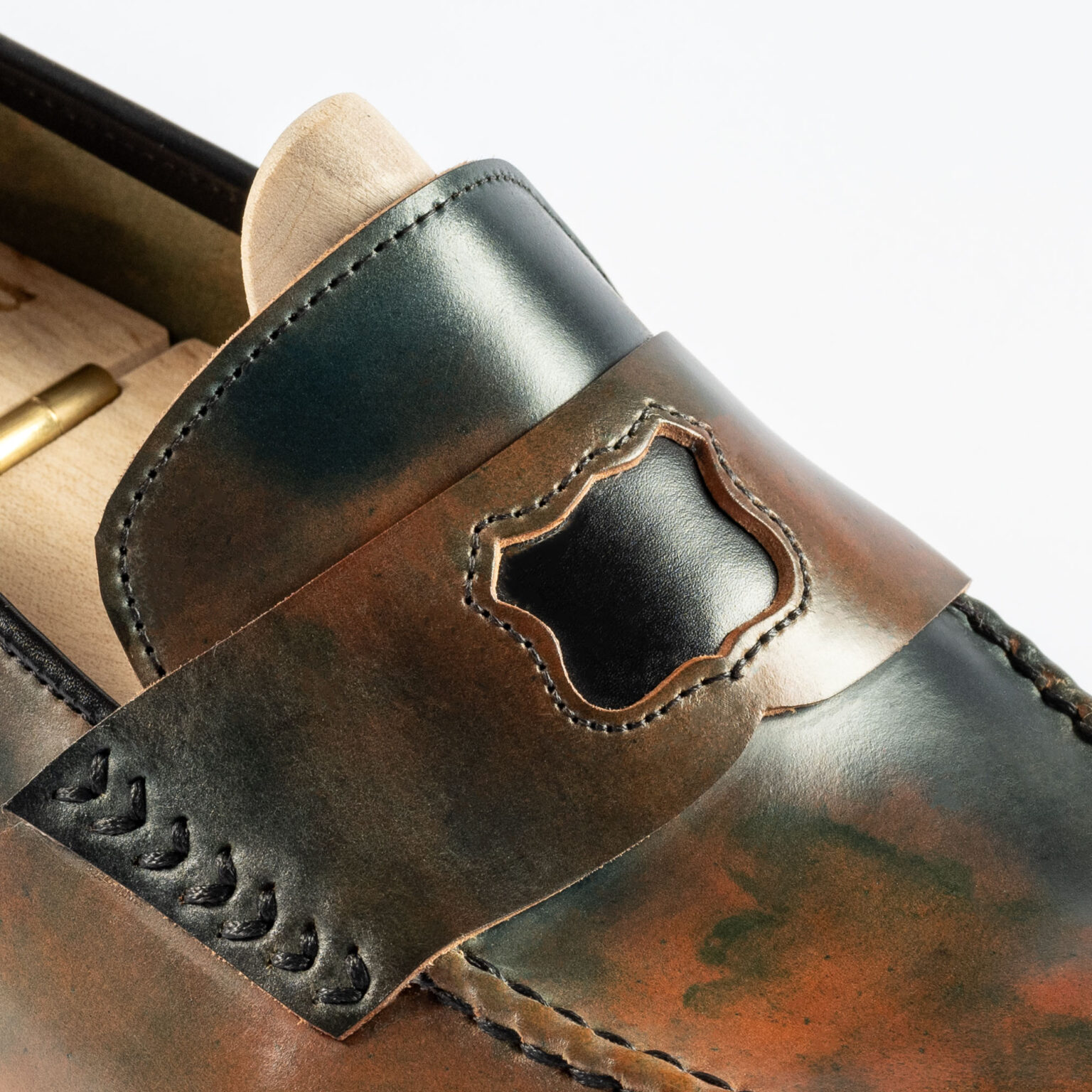 Close up of penny strap on Watling Penny Loafer in Black Marbled Horween Shell Cordovan