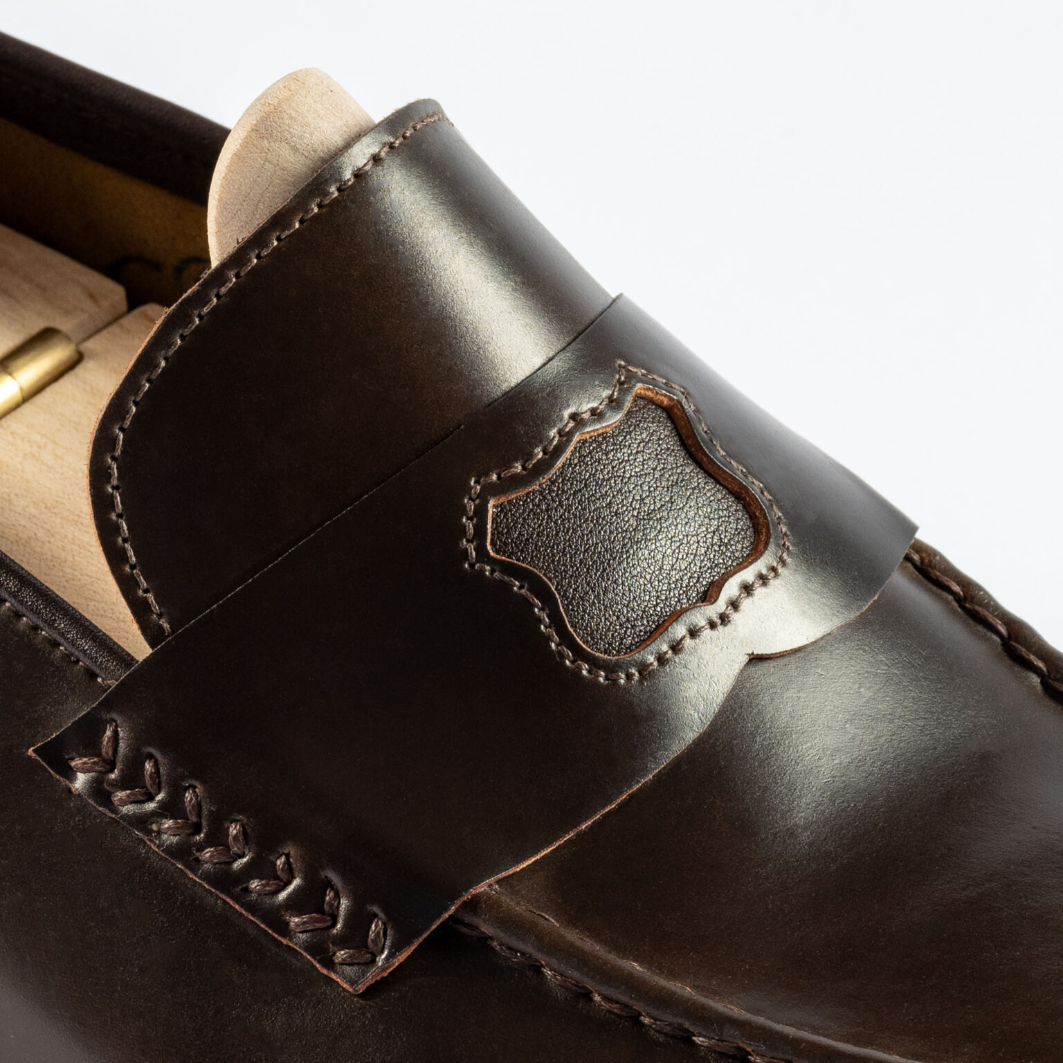 Close up of penny strap Watling Penny Loafer in Dark Cognac Horween Shell Cordovan