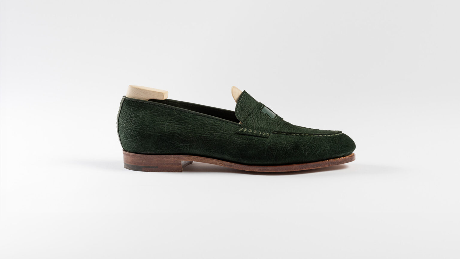 Side view of Watling Penny Loafer in Racing Green CF Stead Janus Calf