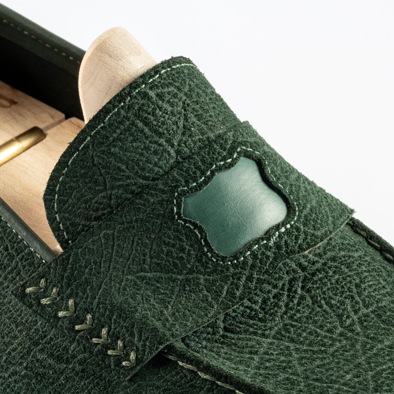 Close up of penny strap on Watling Penny Loafer in Racing Green CF Stead Janus Calf