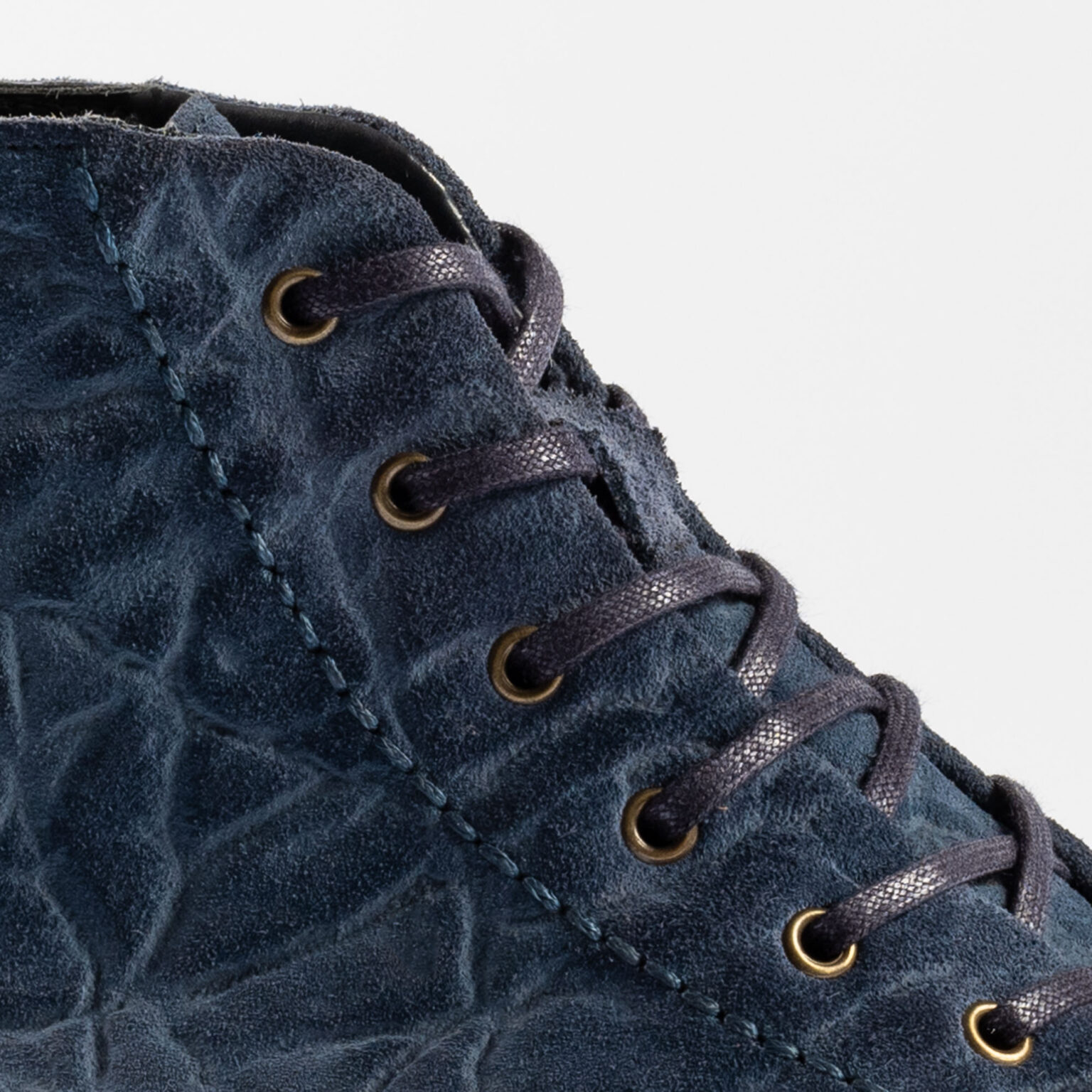 Side closeup of Woburn Monkey Boot in Navy CF Stead Janus Calf with Edwin emboss